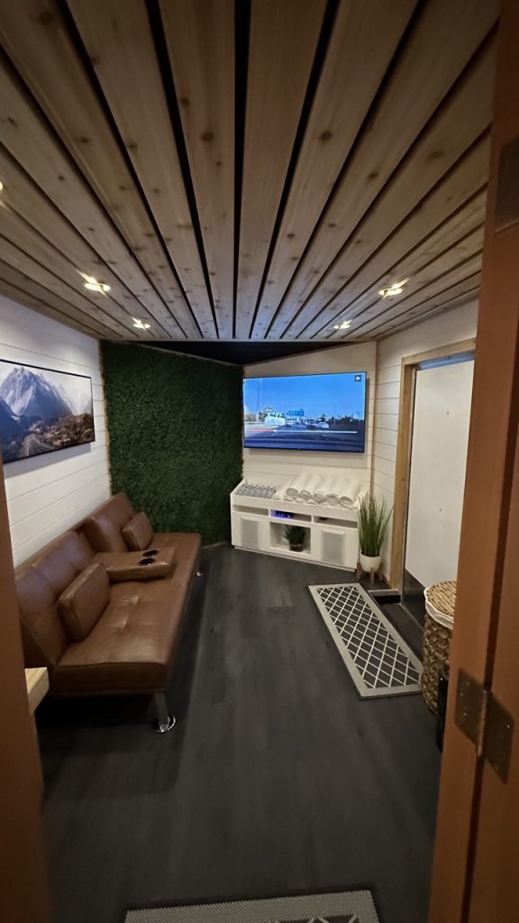 Inside view of a modern sauna lounge, designed for relaxation and social connection.
