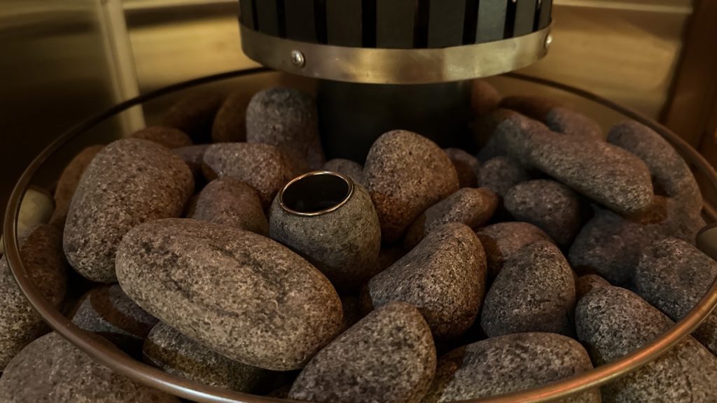 Bliss Mobile Sauna rocks heating up in a luxury cedar sauna rental.