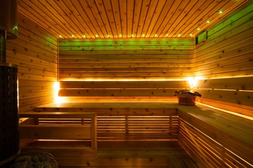 Mobile sauna experience at home in Edmonton with warm lighting and relaxation setup